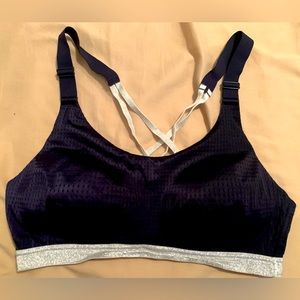 Lightly used, dark blue/ black sports bra w/ sparkle silver lining.